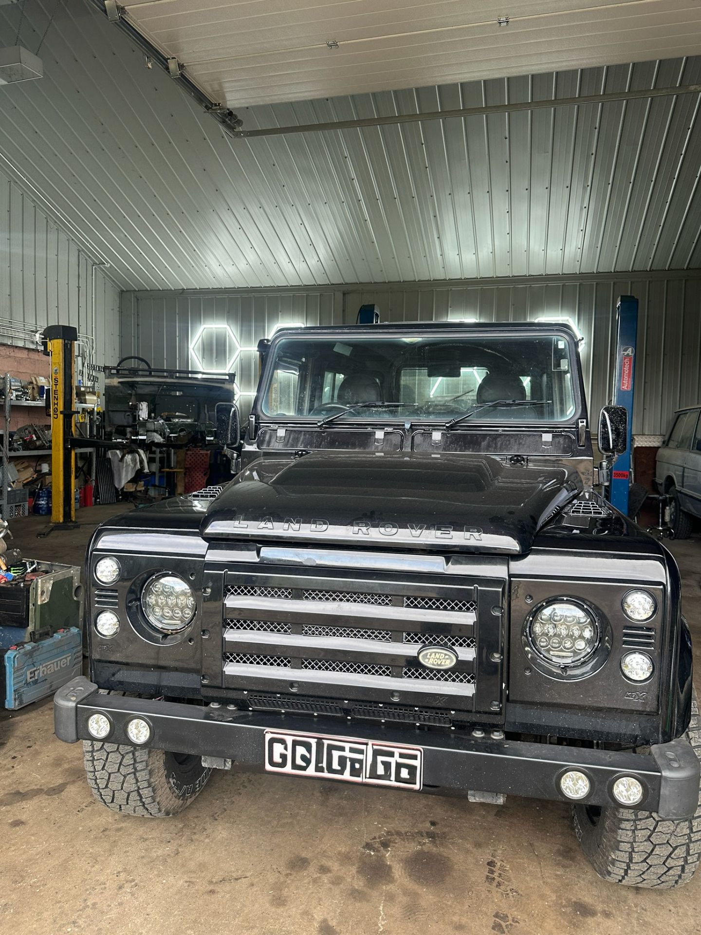 Black Defender with custom grille and LED lighting
